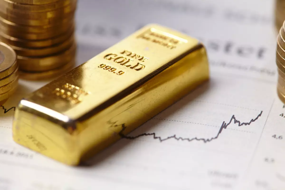 Close up on gold coins and bars