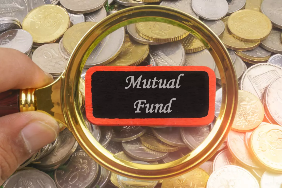 Magnifying glass close up on mutual fund 