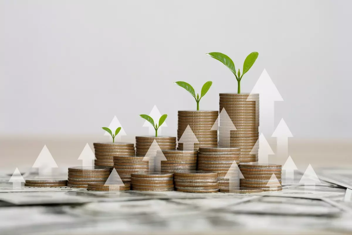 Stacks of coins with upward pointing arrows