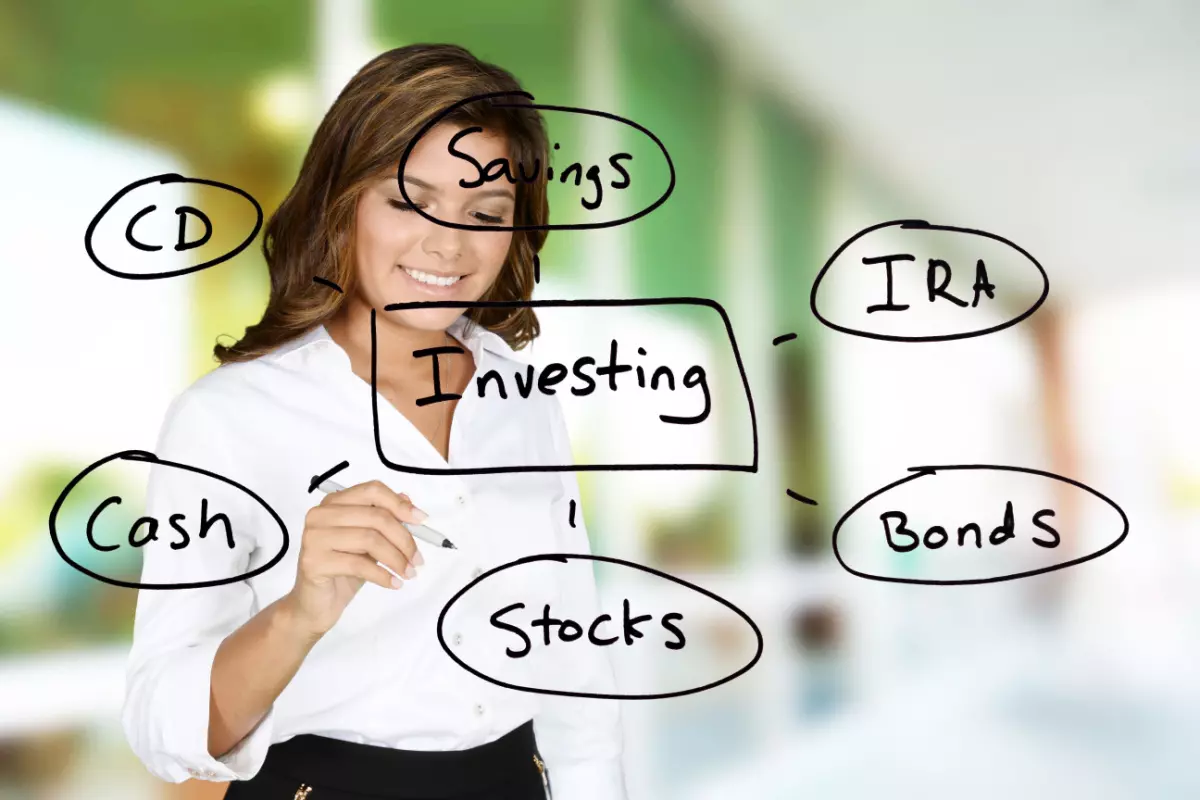 Woman researching investing options including stocks and bonds
